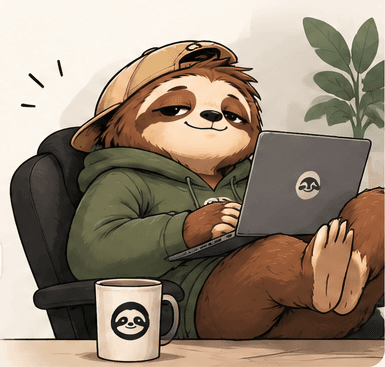 The Worksloth sloth relaxing in a chair with a laptop and a coffee